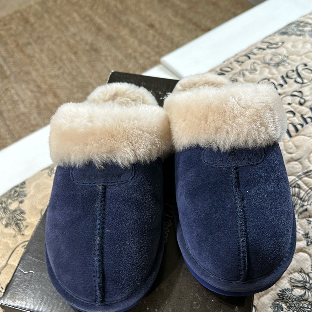 Bear paw indigo color. Like new. Wore to match a top.